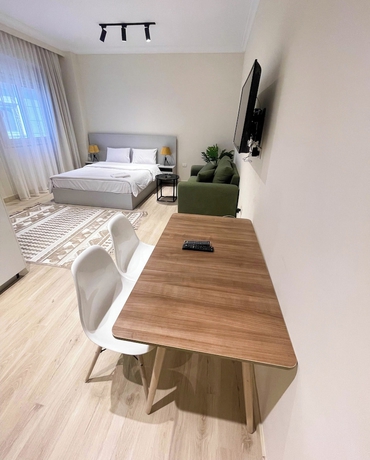 Imagen de la habitación del Hotel Settle Inn Rawda Apartments. Foto 11