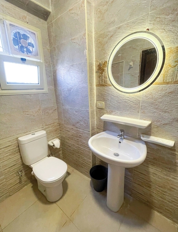 Imagen de la habitación del Hotel Settle Inn Rawda Apartments. Foto 16