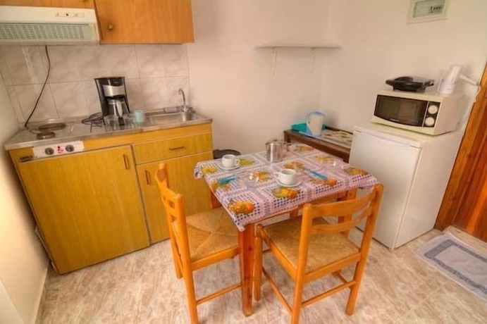 Imagen de la habitación del Hotel Sevas Studios. Foto 16
