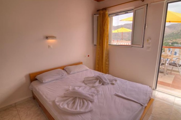 Imagen de la habitación del Hotel Sevas Studios. Foto 17