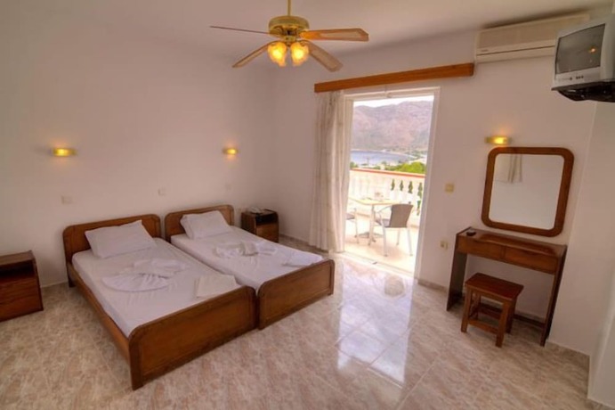 Imagen de la habitación del Hotel Sevas Studios. Foto 19
