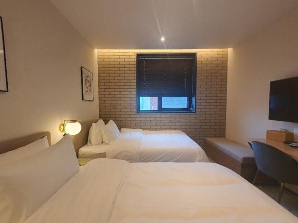 Imagen de la habitación del Hotel Seven Bricks Hotel. Foto 8