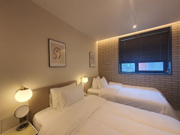 Imagen de la habitación del Hotel Seven Bricks Hotel. Foto 11