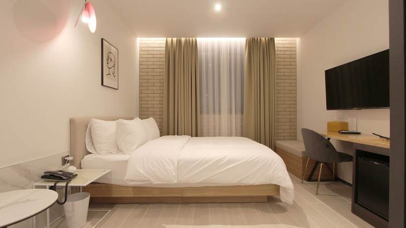 Imagen de la habitación del Hotel Seven Bricks Hotel. Foto 17