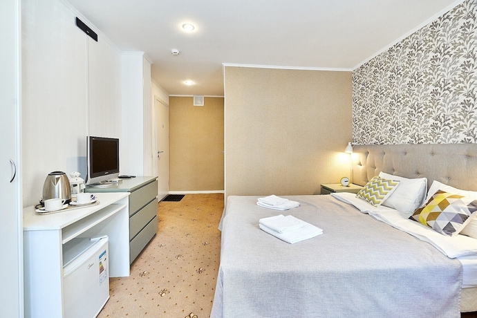 Imagen de la habitación del Hotel Seven Bridges. Foto 12