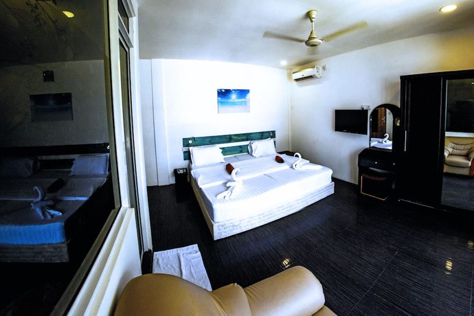 Imagen de la habitación del Hotel Seven Corals. Foto 18