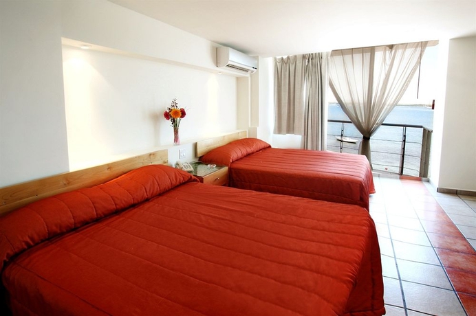Imagen de la habitación del Hotel Seven Crown La Paz Malecon. Foto 8