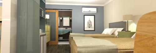 Imagen de la habitación del Hotel Seven Hills Suites I-10. Foto 6