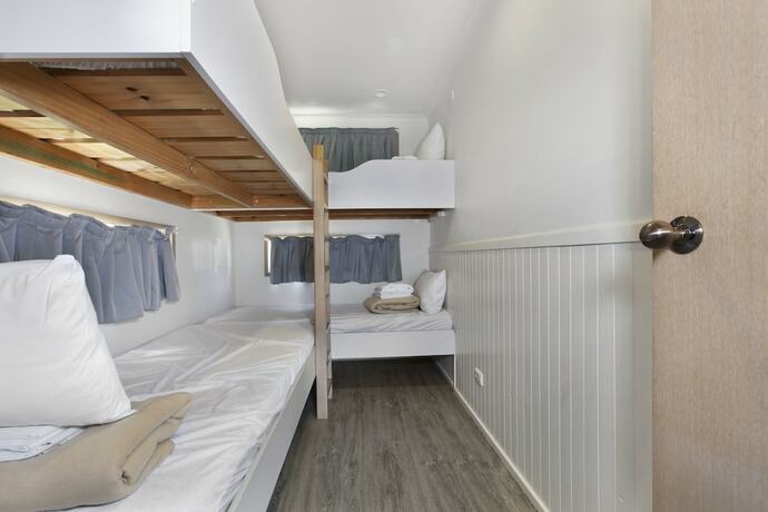 Imagen de la habitación del Hotel Seven Mile Beach Holiday Park. Foto 11