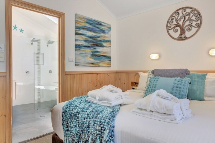 Imagen de la habitación del Hotel Seven Mile Beach Holiday Park. Foto 14