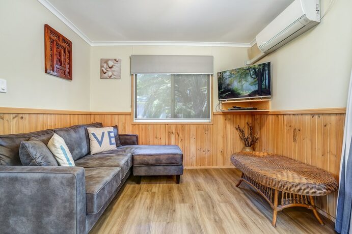 Imagen de la habitación del Hotel Seven Mile Beach Holiday Park. Foto 20