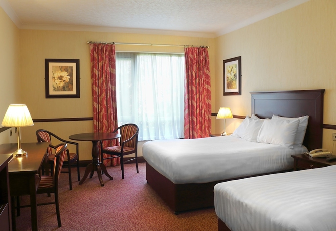 Imagen de la habitación del Hotel Seven Oaks. Foto 7