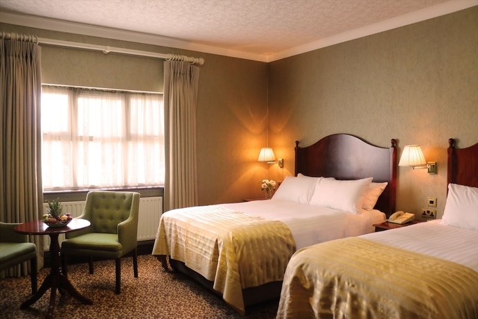 Imagen de la habitación del Hotel Seven Oaks. Foto 9