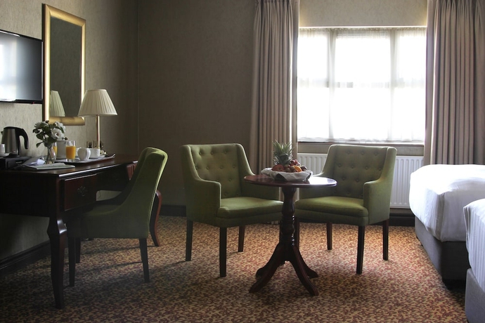 Imagen de la habitación del Hotel Seven Oaks. Foto 10