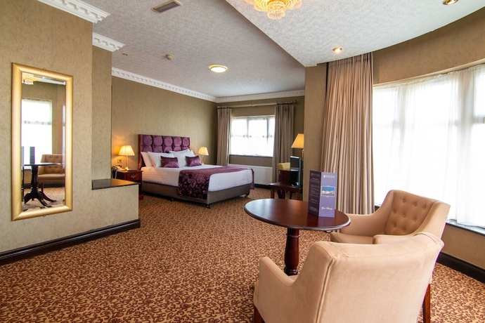 Imagen de la habitación del Hotel Seven Oaks. Foto 15