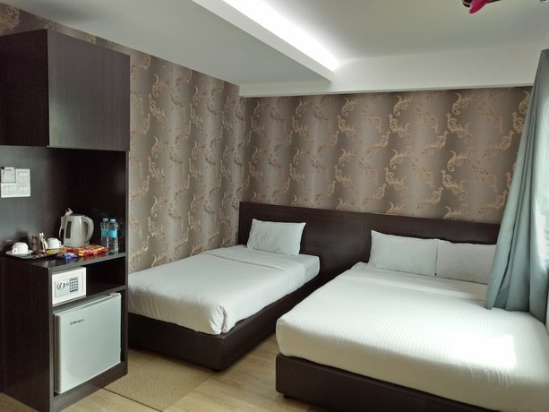 Imagen de la habitación del Hotel Seven, Simpang Ampat. Foto 3