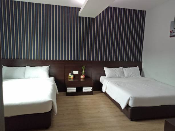 Imagen de la habitación del Hotel Seven, Simpang Ampat. Foto 4