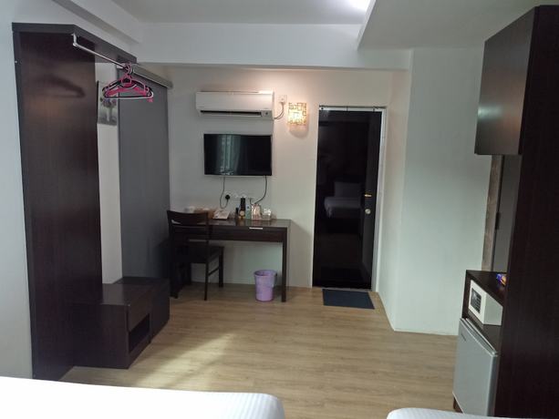 Imagen de la habitación del Hotel Seven, Simpang Ampat. Foto 15