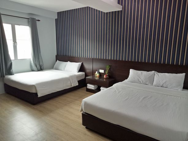 Imagen de la habitación del Hotel Seven, Simpang Ampat. Foto 17