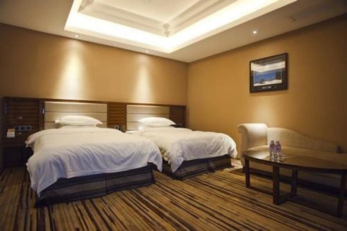 Imagen de la habitación del Hotel Seven Star Commercial Nanchang. Foto 4
