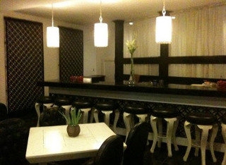 Imagen del bar/restaurante del Hotel Seven Suites Observatory Hotel. Foto 12