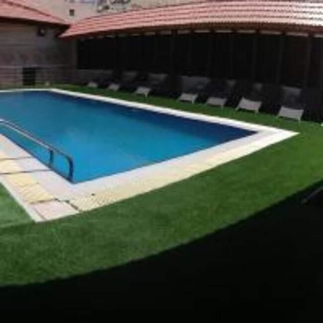 Imagen de la piscina del Hotel Seven Wonders. Foto 15