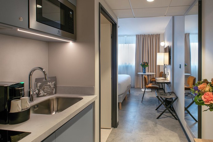 Imagen de la habitación del Hotel Sevenline Aparthotel Purpan Toulouse. Foto 7