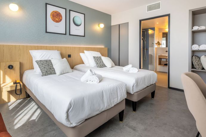 Imagen de la habitación del Hotel Sevenline Aparthotel Purpan Toulouse. Foto 8