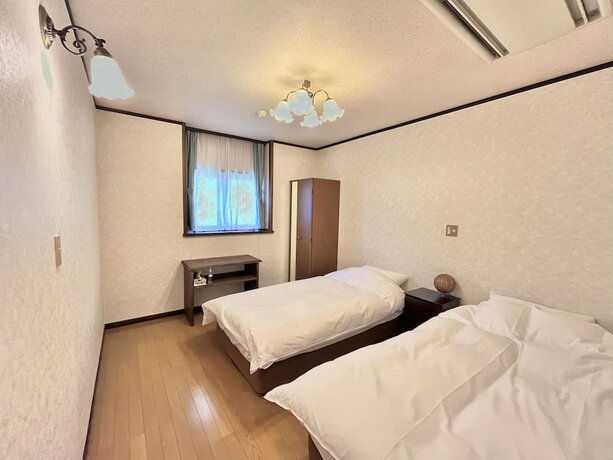 Imagen de la habitación del Hotel Seventh Heaven Hakuba. Foto 17