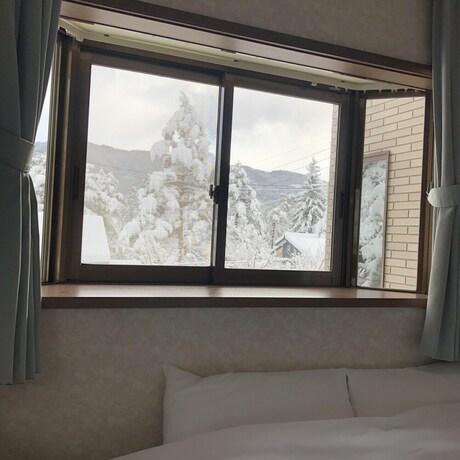 Imagen de la habitación del Hotel Seventh Heaven Hakuba. Foto 27