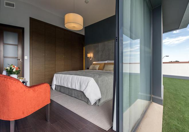 Imagen de la habitación del Hotel Sevilla Green Suites. Foto 2