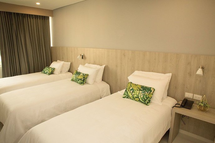 Imagen de la habitación del Hotel Sexta Avenida Inn. Foto 7