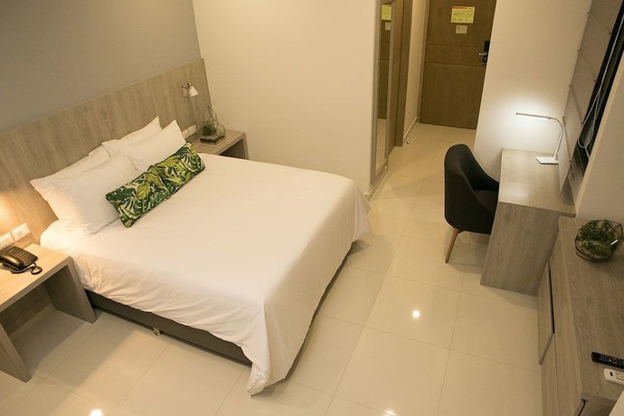 Imagen de la habitación del Hotel Sexta Avenida Inn. Foto 8