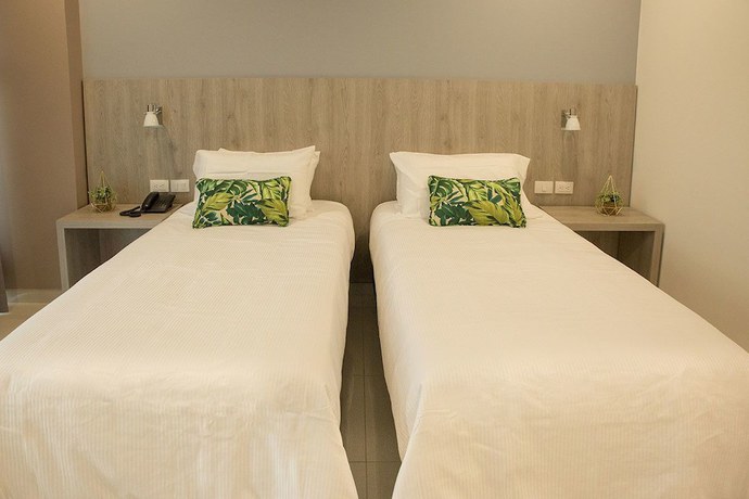 Imagen de la habitación del Hotel Sexta Avenida Inn. Foto 9