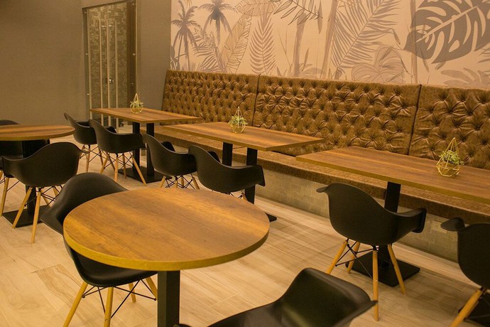 Imagen del bar/restaurante del Hotel Sexta Avenida Inn. Foto 5