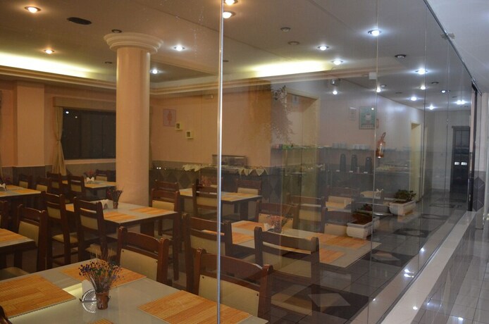 Imagen del bar/restaurante del Hotel Sg Palace. Foto 15