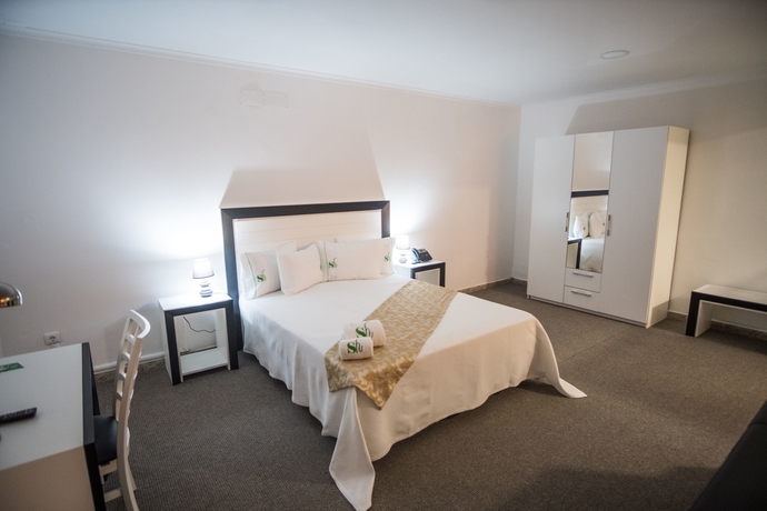 Imagen de la habitación del Hotel Sh Boutique. Foto 10