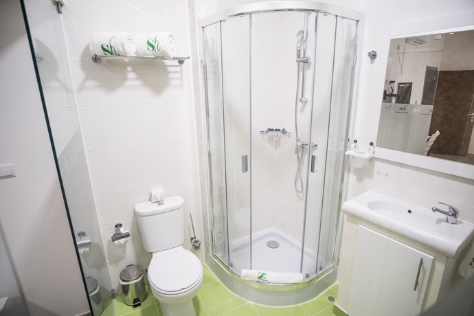 Imagen de la habitación del Hotel Sh Boutique. Foto 12