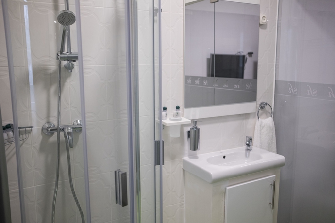 Imagen de la habitación del Hotel Sh Boutique. Foto 13