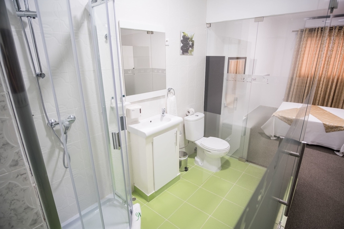 Imagen de la habitación del Hotel Sh Boutique. Foto 14