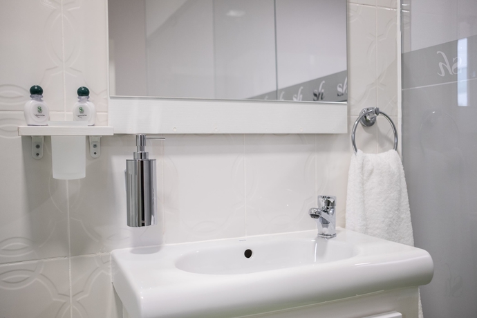 Imagen de la habitación del Hotel Sh Boutique. Foto 17