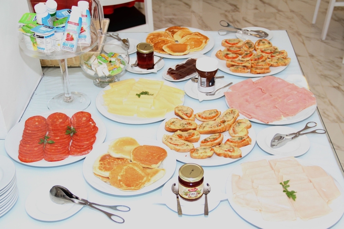 Imagen del bar/restaurante del Hotel Sh Boutique. Foto 8