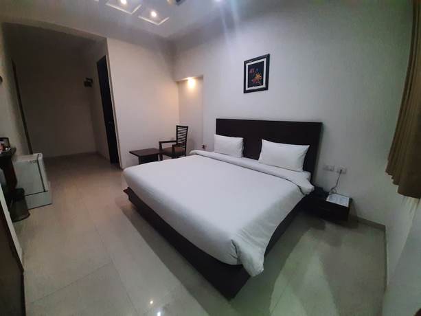 Imagen de la habitación del Hotel Shacon Suites. Foto 5