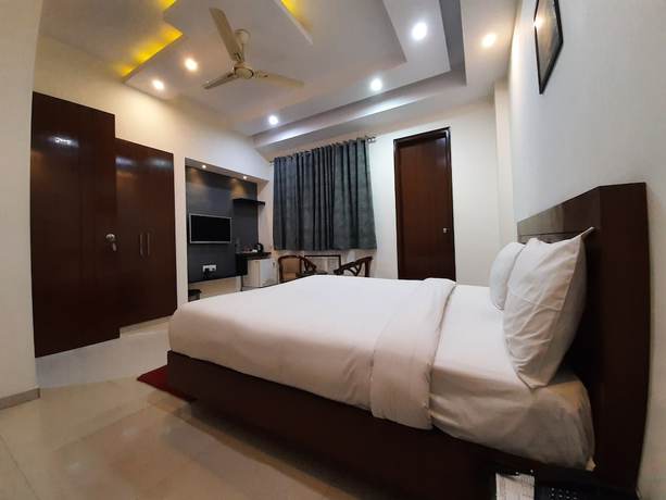 Imagen de la habitación del Hotel Shacon Suites. Foto 8
