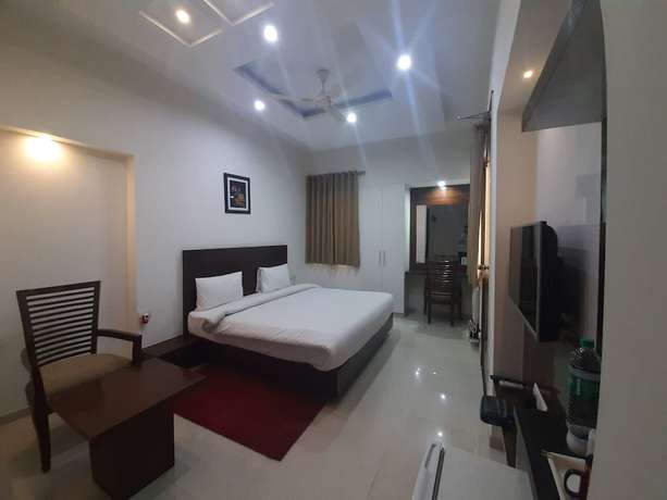 Imagen de la habitación del Hotel Shacon Suites. Foto 9