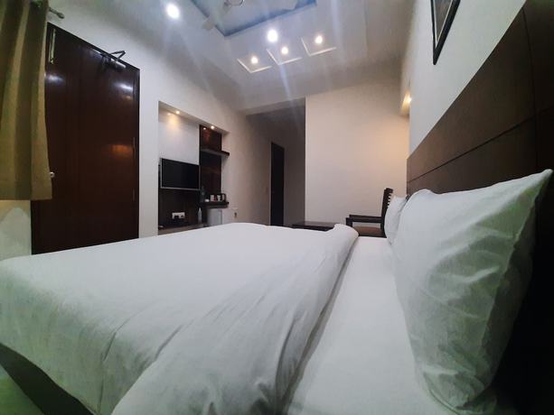 Imagen de la habitación del Hotel Shacon Suites. Foto 10