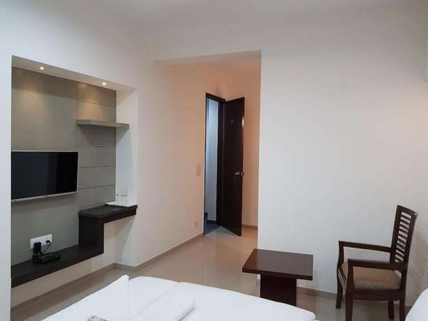 Imagen de la habitación del Hotel Shacon Suites. Foto 12
