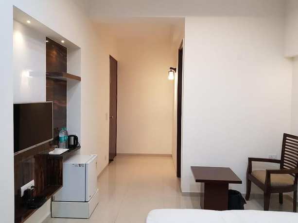 Imagen de la habitación del Hotel Shacon Suites. Foto 13