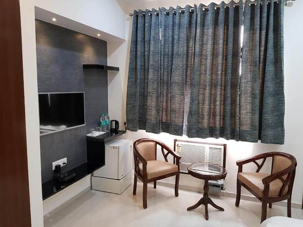Imagen de la habitación del Hotel Shacon Suites. Foto 14