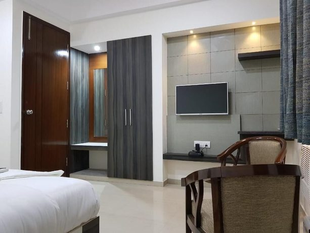 Imagen de la habitación del Hotel Shacon Suites. Foto 15